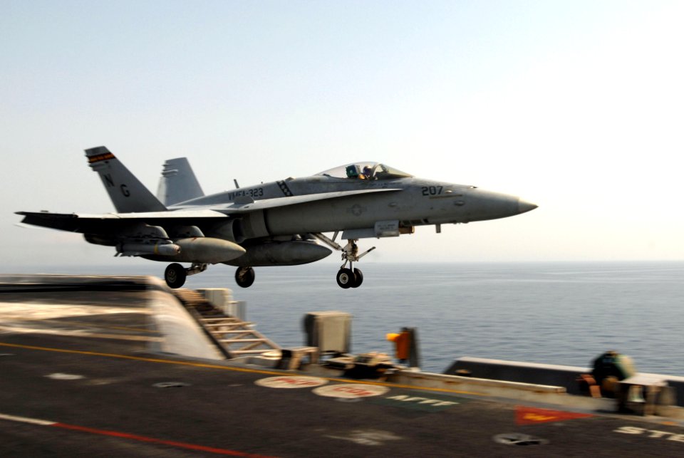 US Navy 070526-N-2659P-029 An F-A-18C Hornet from the Death Rattlers of Marine Fighter Attack Squadron (VFA) 323 launches from the flight deck of the Nimitz-class aircraft carrier USS John C. Stennis (CVN 74)