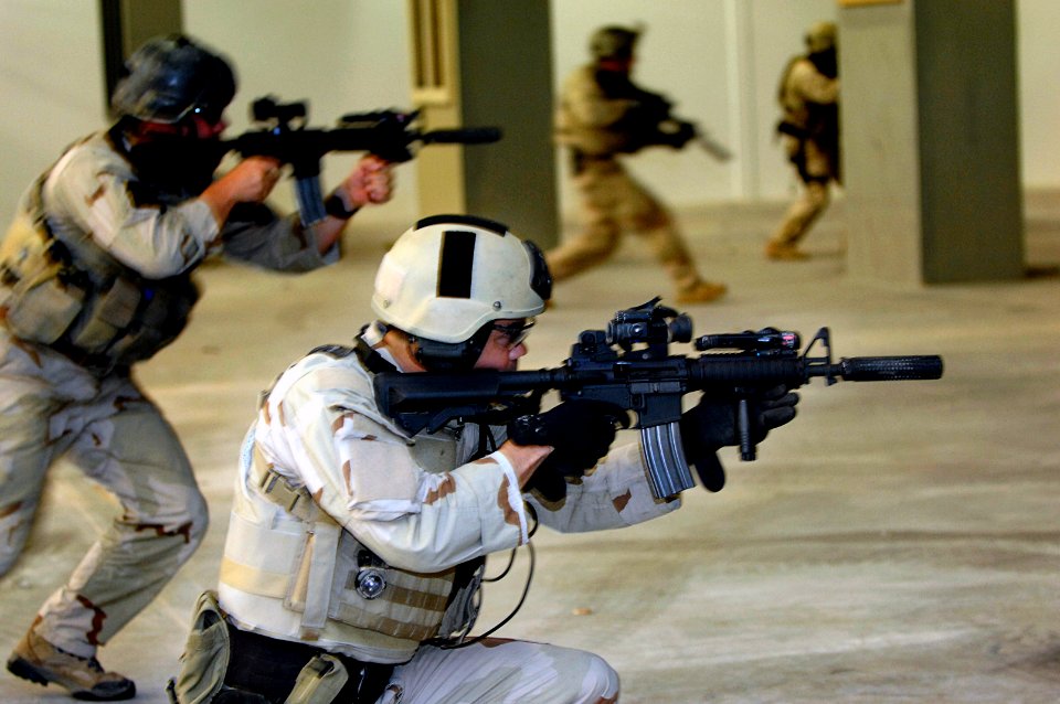 US Navy 070605-N-3642E-586 U.S. Navy SEALs (Sea, Air, Land) perform a live fire exercise for the Secretary of the Navy (SECNAV) The Honorable Dr. Donald C. Winter