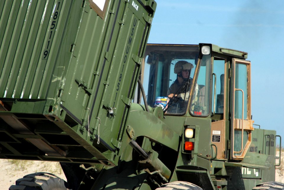 US Navy 070527-N-1831S-040 Marines from 22nd Marine Expeditionary Unit (22nd MEU) bring their equipment off a Landing Craft Air Cushion (LCAC) onto Onslow Beach using forklifts