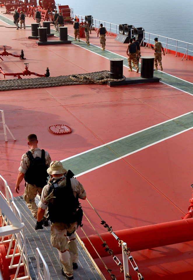 US Navy 070603-N-0684R-166 Visit, board, search and seizure (VBSS) team members from guided-missile destroyer USS Preble (DDG 88), U.S. Coast Guard and Iraqi forces board an oil tanker in the Persian Gulf
