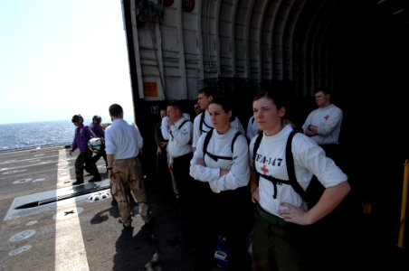 US Navy 070605-N-3729H-006 Sailors await medical supplies aboard the amphibious transport dock USS Denver (LPD 9)