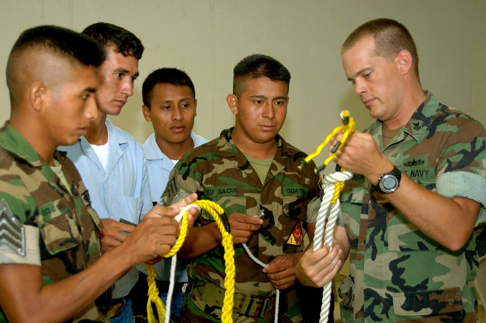US Navy 070604-N-0989H-023 Guatemalan sailors and officer cadets practice tying knots during small boat operations subject matter exchanges on board High Speed Vessel (HSV) 2 Swift