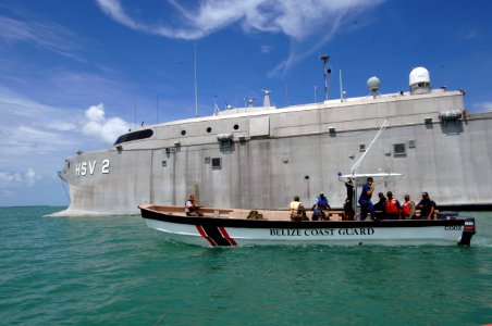 US Navy 070611-N-0989H-028 U.S. service members from the Expeditionary Training Command and Coast Guard International Training Division conduct a vessel assessment aboard a Belizean Coast Guard boat