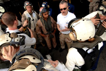 US Navy 070605-N-3729H-003 USS John C. Stennis (CVN 74) Senior Medical Officer, Cmdr. Jonathan Stinson (top center) provides a situational brief to medical personnel from the Stennis and Carrier Air Wing (CVW) 9