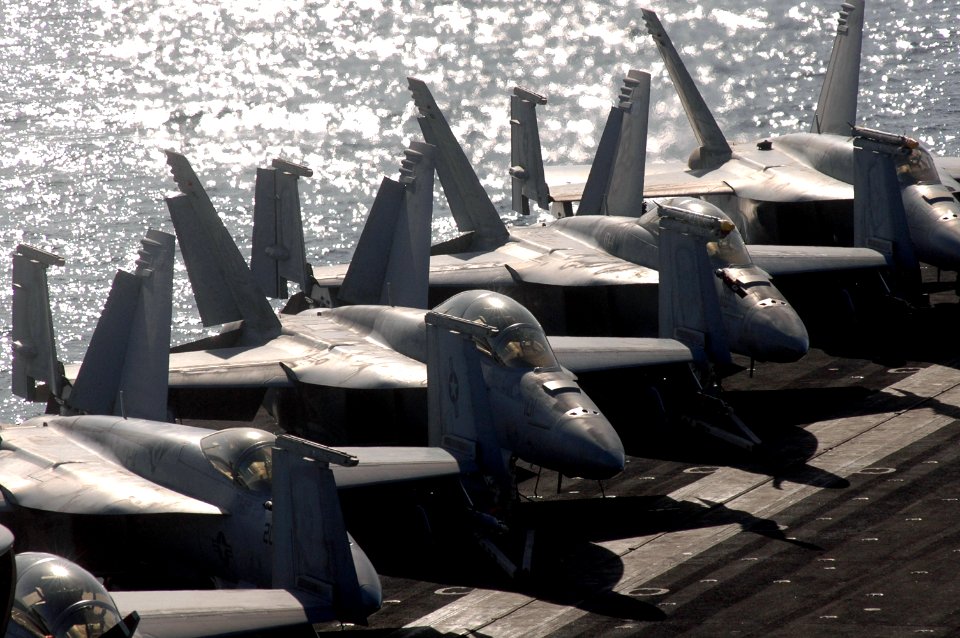 US Navy 070606-N-0890S-007 Aircraft line the flight deck of the nuclear-powered aircraft carrier USS Nimitz (CVN 68)