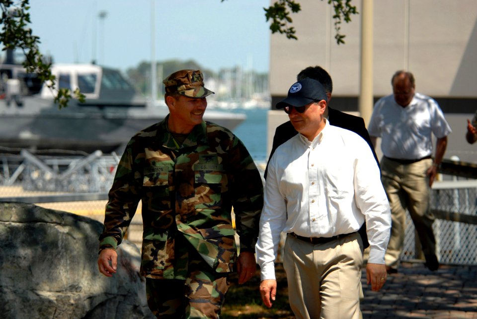 US Navy 070605-N-4515N-009 Commodore of Naval Special Warfare Group (NSWG) 4, Capt. Evin Thompson greets Secretary of the Navy (SECNAV) the Honorable Donald Winter upon arrival at Naval Amphibious Base Little Creek