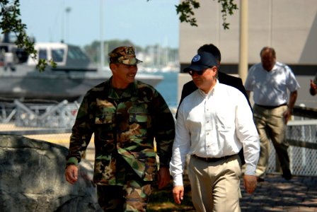 US Navy 070605-N-4515N-009 Commodore of Naval Special Warfare Group (NSWG) 4, Capt. Evin Thompson greets Secretary of the Navy (SECNAV) the Honorable Donald Winter upon arrival at Naval Amphibious Base Little Creek