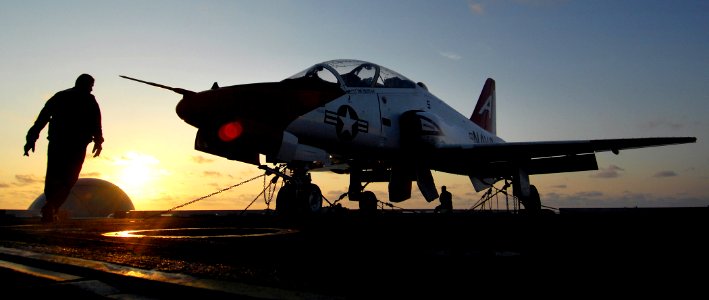 US Navy 070608-N-2984R-115 Personnel assigned to Training Air Wing (TRAWING) 2 perform a post flight inspection on one of the squadrons T-45 Goshawk aboard Nimitz-class aircraft carrier USS Harry S. Truman