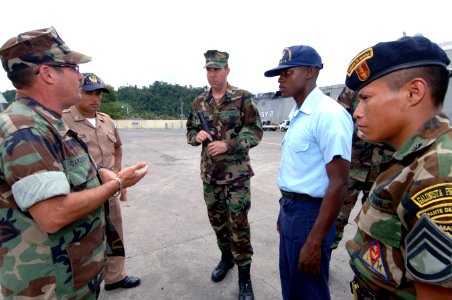 US Navy 070606-N-0989H-064 A Guatemalan sailor conducts a vehicle inspection during port security subject matter exchanges
