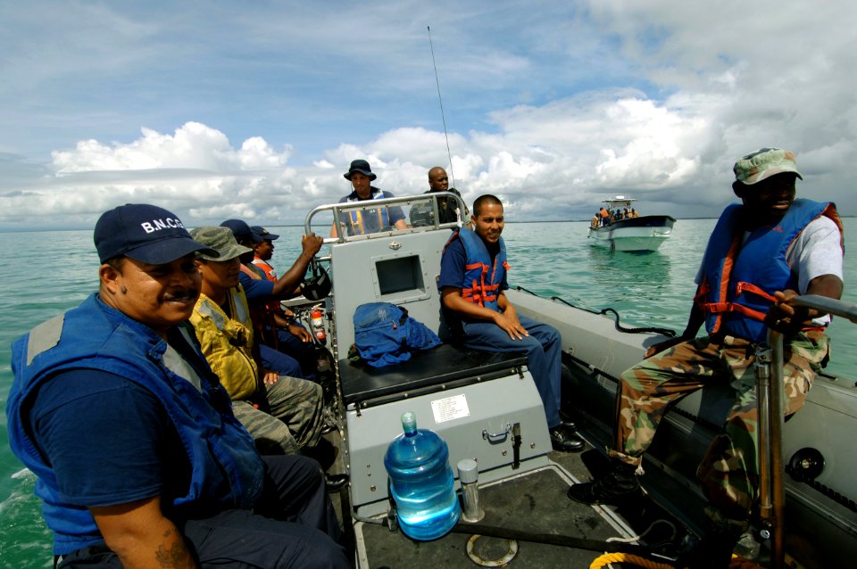US Navy 070613-N-0989H-005 Chief Boatswain's Mate William Partington from the U.S. Coast Guard International Training Division conducts small boat operations subject matter exchanges with personnel from the Belize National Coas