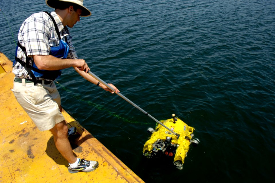 US Navy 070611-N-7676W-121 Franz Hoover, Massachusetts Institute of Technology, assists the Bluefin Hovering Autonomous Underwater Vehicle (HAUV) prior to a demonstration of its capabilities for close-range hull inspection duri