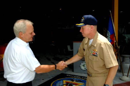 US Navy 070614-N-0989H-011 Commander, Task Group 40.9, Capt. Douglas Wied welcomes the Honorable Robert Dieter, U.S. Ambassador to Belize, aboard High Speed Vessel (HSV) 2 Swift during a tour and luncheon photo