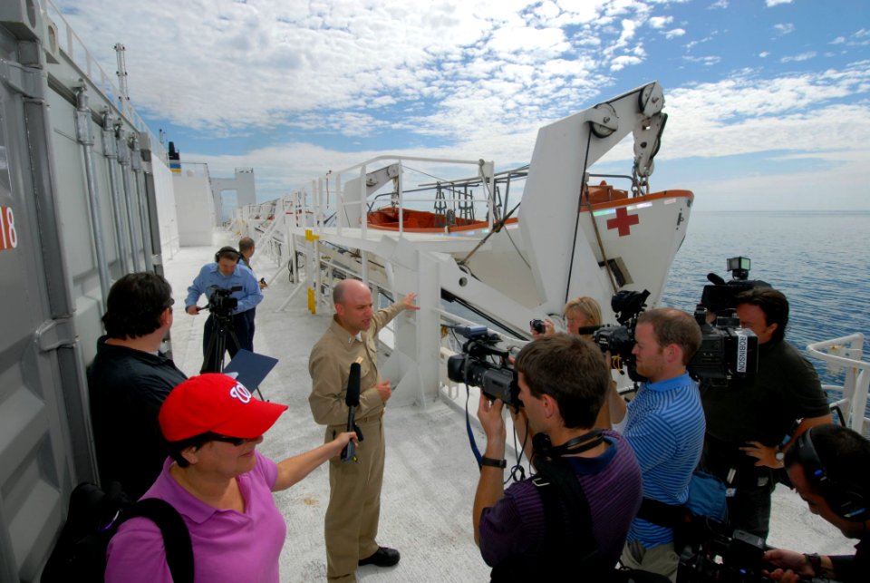 US Navy 070617-N-8704K-090 Lt. j.g. Michael McCarty guides a tour of Miami-area media aboard Military Sealift Command hospital ship USNS Comfort (T-AH 20)