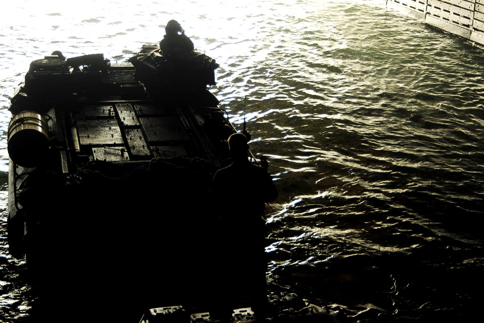 US Navy 070615-N-1831S-007 Marine Expeditionary Unit (MEU) 22 embark on board amphibious landing dock ship USS Ponce (LPD 15) using amphibious assault vehicles