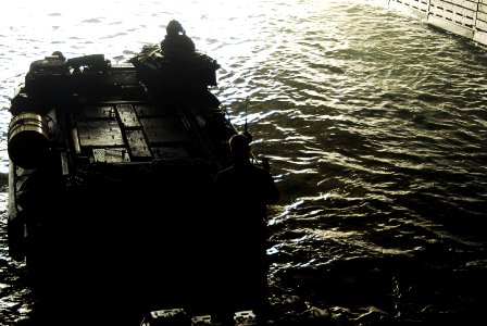 US Navy 070615-N-1831S-007 Marine Expeditionary Unit (MEU) 22 embark on board amphibious landing dock ship USS Ponce (LPD 15) using amphibious assault vehicles
