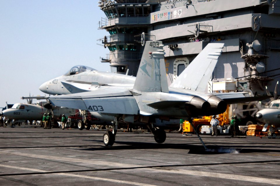 US Navy 070612-N-8119R-141 An F-A-18C Hornet lands safely on the flight deck of the nuclear-powered aircraft carrier USS Nimitz (CVN 68)