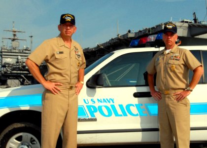 US Navy 070611-N-6724S-007 Dwayne (left) and Michael Reese both promoted to Master Chief Master-at-Arms this year