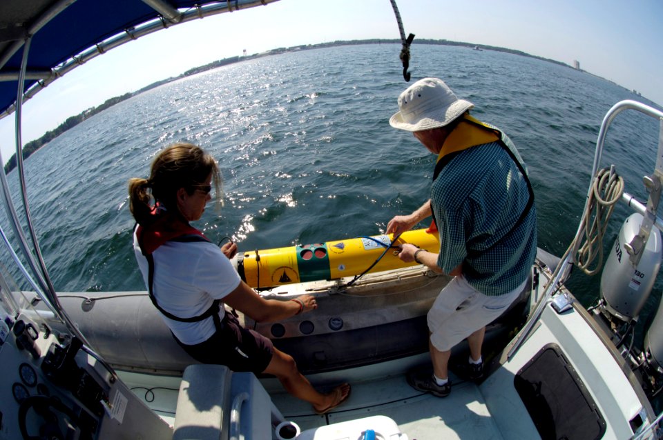 US Navy 070611-N-7676W-166 Amy Kukulya and Tom Austin, both from the Woods Hole Oceanographic Institution, prepare to launch a Remote Environmental Monitoring Units (REMUS) during Autonomous Underwater Vehicle (AUV) Fest 2007