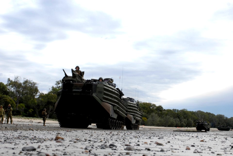 US Navy 070617-N-4207M-132 Marine Corps amphibious assault vehicles from the 3rd Marine Expeditionary Brigade, 31st Marine Expeditionary Unit, transit the beach during an amphibious landing rehearsal