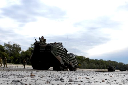 US Navy 070617-N-4207M-132 Marine Corps amphibious assault vehicles from the 3rd Marine Expeditionary Brigade, 31st Marine Expeditionary Unit, transit the beach during an amphibious landing rehearsal