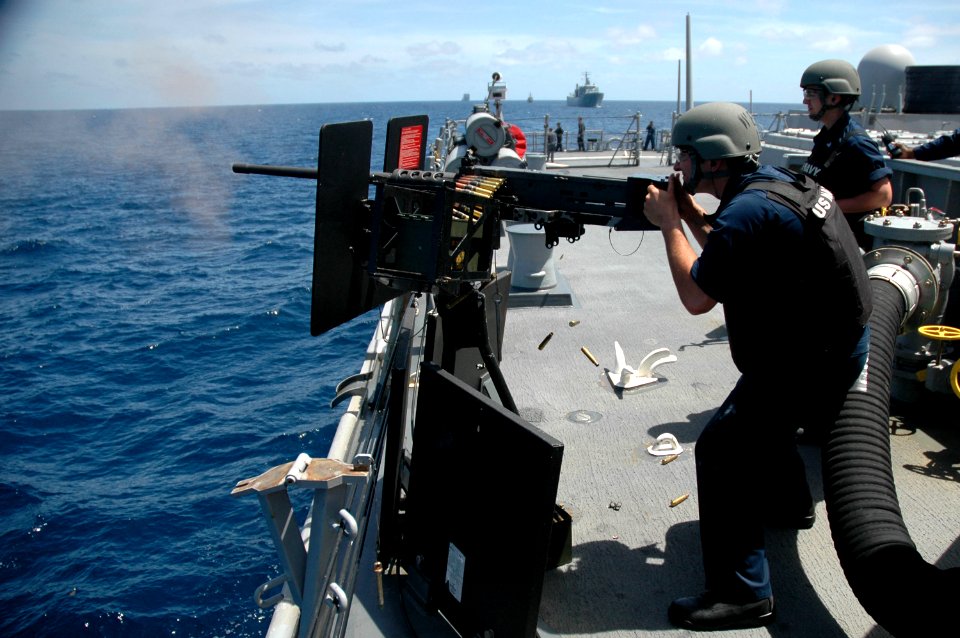 USS Curtis Wilbur conducts a live-fire exercise. (9018287170)
