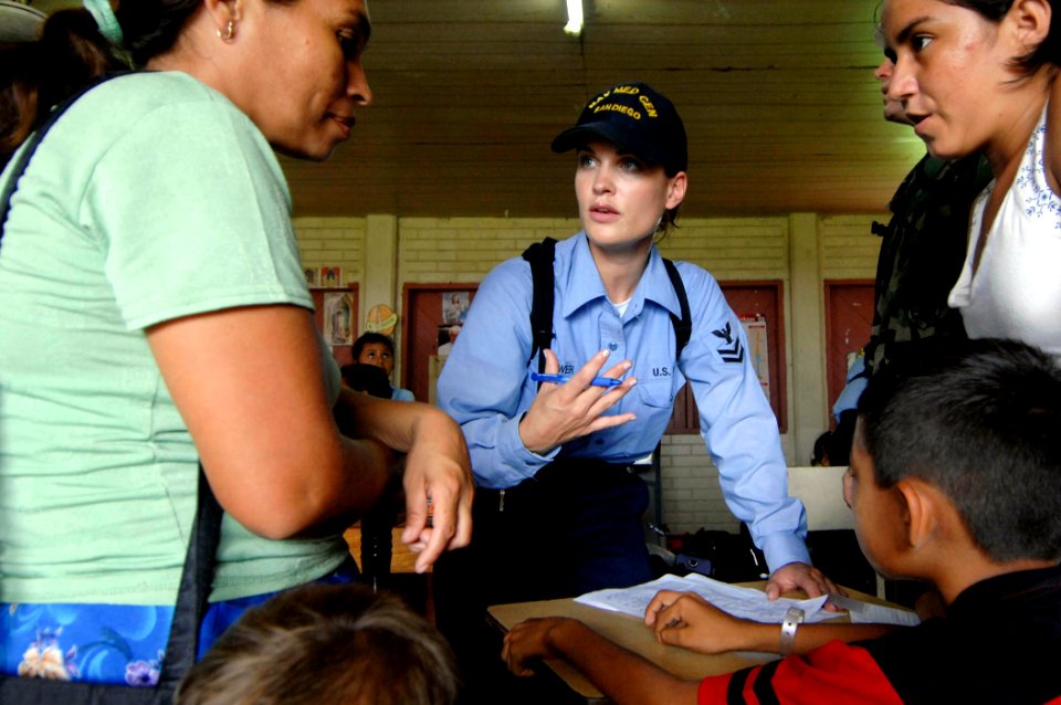 US Navy 070622-N-0194K-427 Hospital Corpsman 2nd Class Tali Brewer registers patients at the Monsignor Romero Roman Catholic School in the Valley of Peace