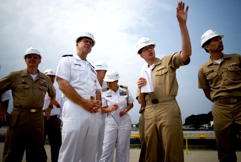 US Navy 070619-N-0696M-210 Chief of Naval Operations (CNO) Adm. Mike Mullen is briefed on the preparations being made at U.S. Fleet Activities, Yokosuka