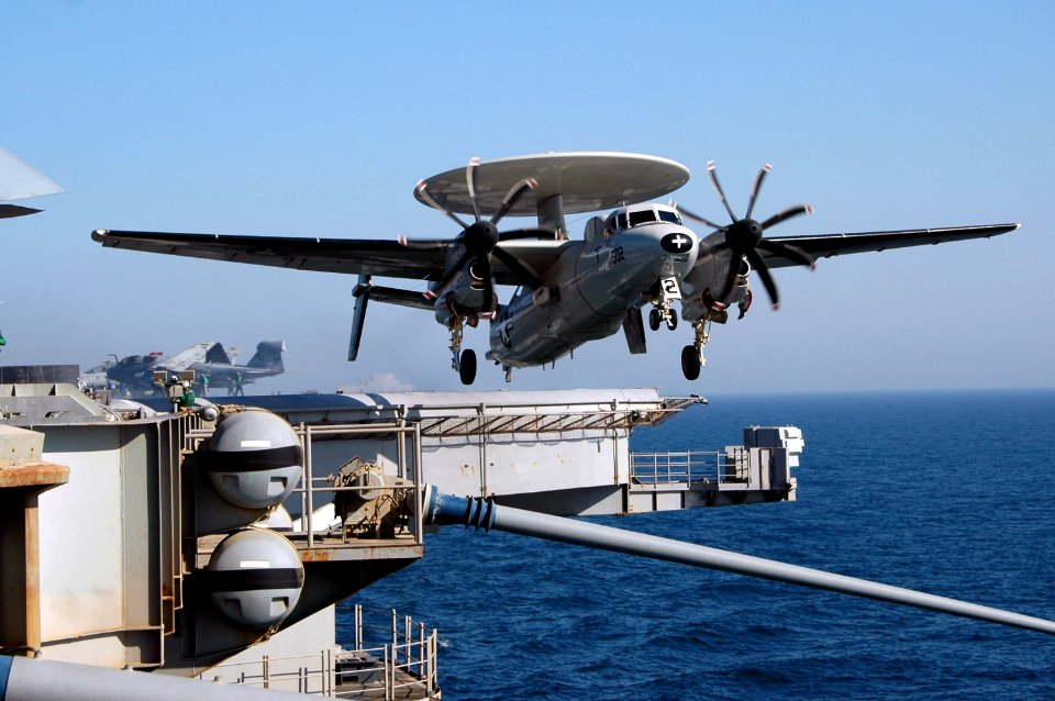 US Navy 070619-N-0890S-036 An E-2C Hawkeye, assigned to the Wallbangers of Carrier Airborne Early Warning Squadron (VAW) 117, launches off the flight deck of nuclear-powered aircraft carrier USS Nimitz (CVN 68)