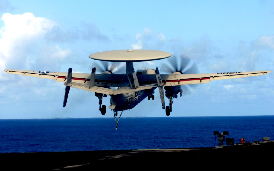 US Navy 070620-N-3729H-060 An E-2C Hawkeye, assigned to the Golden Hawks of Carrier Airborne Early Warning Squadron (VAW) 112, bolters off the flight deck of Nimitz-class aircraft carrier USS John C. Stennis (CVN 74)