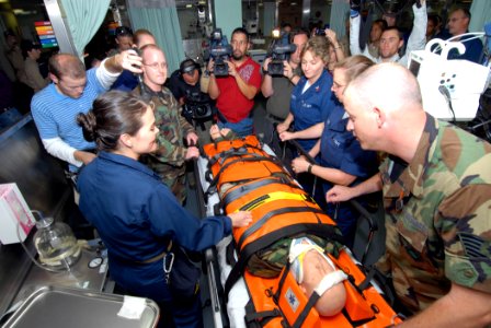 US Navy 070617-N-8704K-122 Local Miami-area media interview Lt j.g. Melissa McMurry while she conducts medical training aboard Military Sealift Command hospital ship USNS Comfort (T-AH 20)