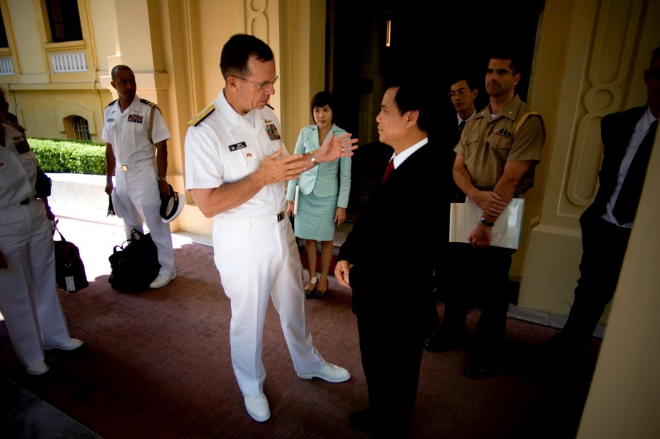US Navy 070620-N-0696M-227 Chief of Naval Operations (CNO) Adm. Mike Mullen speaks with Vietnamese Vice Foreign Minister Le Cong Phung after an office call