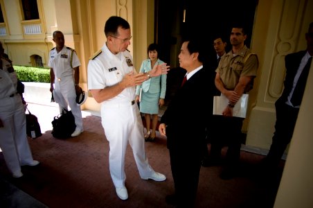 US Navy 070620-N-0696M-227 Chief of Naval Operations (CNO) Adm. Mike Mullen speaks with Vietnamese Vice Foreign Minister Le Cong Phung after an office call