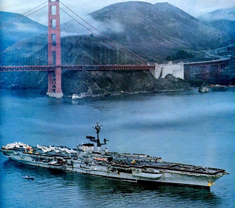 USS Coral Sea (CVA-43) passing under the Golden Gate Bridge on 8 November 1973