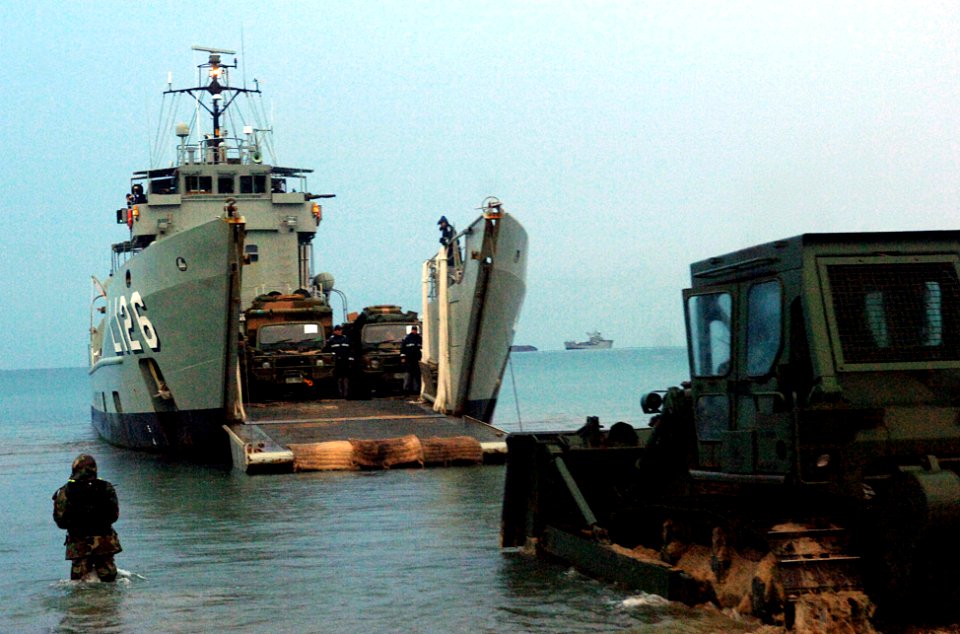 US Navy 070622-F-1644L-006 An Australian landing craft heavy offloads military vehicles at Freshwater Bay with the help of U.S. Navy beach masters, assigned to Beach Master Unit (BMU) 1, during exercise Talisman Saber 2007 (TS0