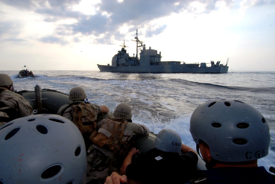 US Navy 070624-N-0841E-143 Members assigned to the visit, board, search and seizure (VBSS) team on board guided-missile cruiser USS Vicksburg (CG 69) take part in a boarding exercise
