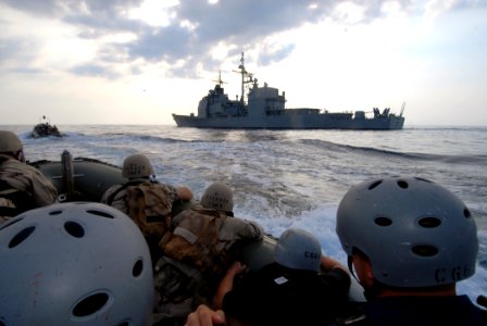 US Navy 070624-N-0841E-143 Members assigned to the visit, board, search and seizure (VBSS) team on board guided-missile cruiser USS Vicksburg (CG 69) take part in a boarding exercise