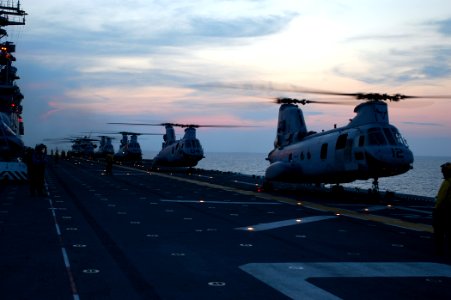 US Navy 070624-N-4014G-024 Four CH-46 Sea Knight helicopters and two CH-53E Super Stallion helicopters from Marine Medium Helicopter Squadron (HMM) 261 prepare to take off from the flight deck of amphibious assault ship USS Kea photo