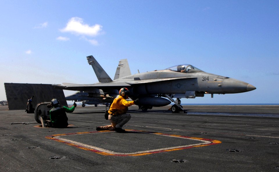US Navy 070620-N-3729H-020 An F-A-18C Hornet, from the Blue Diamonds of Strike Fighter Squadron (VFA) 146, launches off Nimitz-class aircraft carrier USS John C. Stennis (CVN 74)
