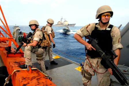 US Navy 070624-N-0841E-200 Members assigned to the visit, board, search and seizure (VBSS) team on board guided-missile cruiser USS Vicksburg (CG 69) take part in a boarding scenario training exercise