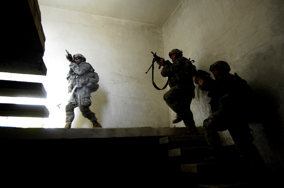 US Navy 070623-N-5555T-025 U.S. Army Soldiers inspect a suspected insurgent base in the Arab Jabour region of Iraq