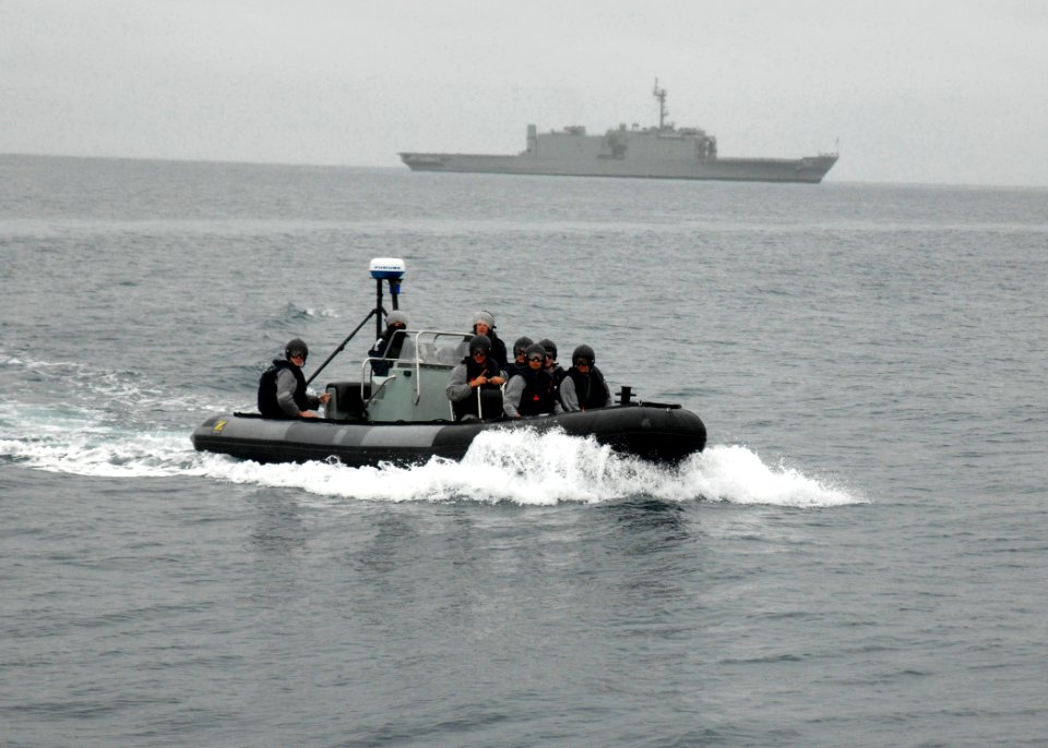 US Navy 070623-N-4124C-008 Sailors from Royal Australian Navy ship HMAS Kanimbla (LPA 51), part of the ship's visit, board, search and seizure team, prepare to board a suspicious merchant vessel during boarding drills
