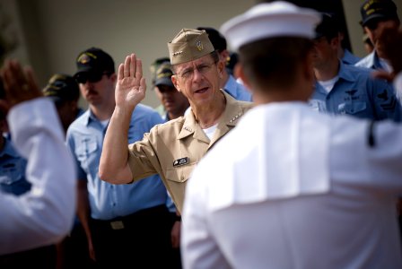 US Navy 070622-N-0696M-147 Chief of Naval Operations (CNO) Adm. Mike Mullen presides over a reenlistment ceremony for Sailors assigned to Naval Air Facility Misawa