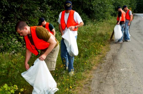 US Navy 070622-N-2143T-002 Sailors assigned to USS Henry Jackson (SSBN 730) pick up litter along Highway 3 as part of Washington's Adopt-a-Highway program