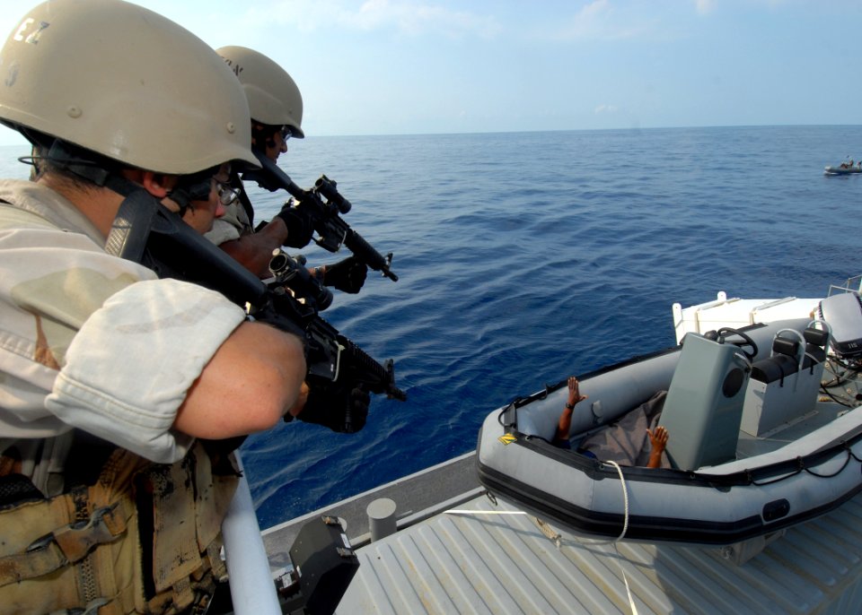 US Navy 070624-N-0841E-247 Members assigned to the Visit, Board, Search and Seizure (VBSS) team on board guided missile cruiser USS Vicksburg (CG 69) take part in a boarding scenario training exercise