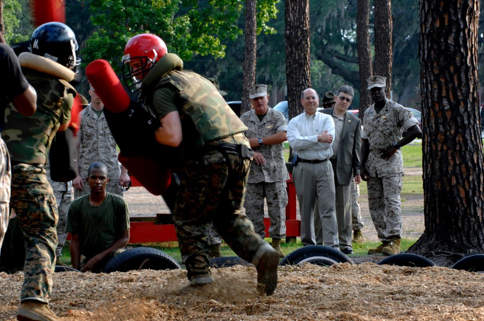 US Navy 070625-N-3642E-427 Secretary of the Navy (SECNAV) The Honorable Dr. Donald C. Winter and Sgt. Maj. of the Marine Corps Carlton W. Kent observe Marine Corps recruits training with pugil sticks