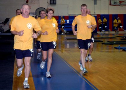 US Navy 070627-N-8053S-008 Senior enlisted leaders attending the Master Chief Petty Officer of the Navy's (MCPON) Leadership Mess Meeting participate in a jog around the gymnasium