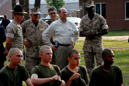 US Navy 070625-N-3642E-440 Secretary of the Navy (SECNAV) The Honorable Dr. Donald C. Winter and Sgt. Maj. of the Marine Corps Carlton W. Kent observe Marine Corps recruits training with pugil sticks