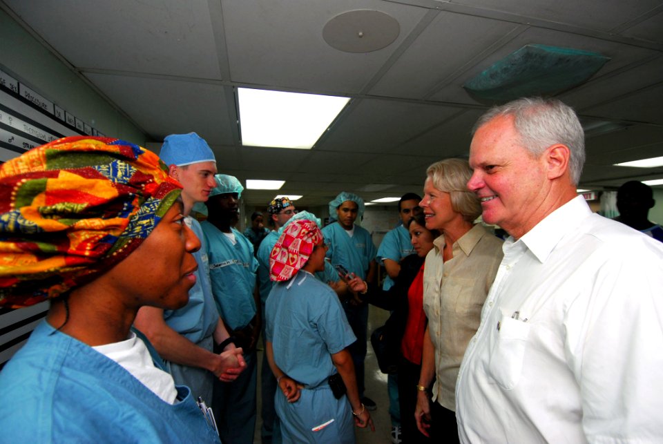 US Navy 070625-N-6081J-002 Hospital Corpsman 2nd Class Sanya M. Washington, speaks to U.S. ambassador to Belize, the Honorable Dr. Robert J. Dieter, in the main operating room of the Military Sealift Command hospital ship USNS