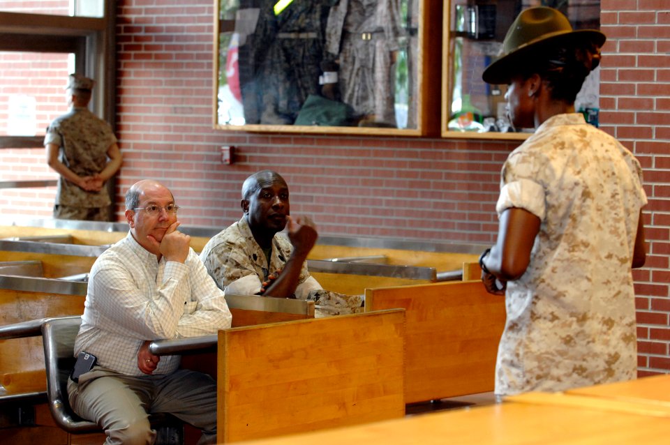 US Navy 070625-N-3642E-179 Secretary of the Navy (SECNAV) The Honorable Dr. Donald C. Winter and Sgt. Maj. of the Marine Corps Carlton W. Kent are briefed on the in-processing procedures