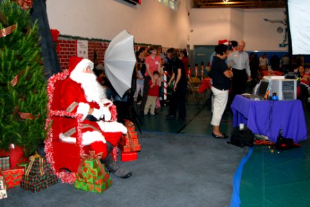 US Navy 070625-N-4995K-051 Families wait in line to see Santa at the Christmas You Missed event at the Murphy Canyon Youth Center